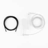 Bmotion Speedrope mit schwarzem PVC- und transparentem Stahlkabel – Top-View der austauschbaren Seiloptionen für individuelles Training.