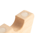 Gummipuffer an der Unterseite einer Bmotion Parallette – rutschfest und oberflächenschonend.