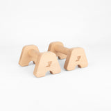 Freigestelltes Produktfoto der Bmotion Parallettes Small aus Holz – minimalistisches Trainingsgerät für Calisthenics und funktionelles Bodyweight-Training.