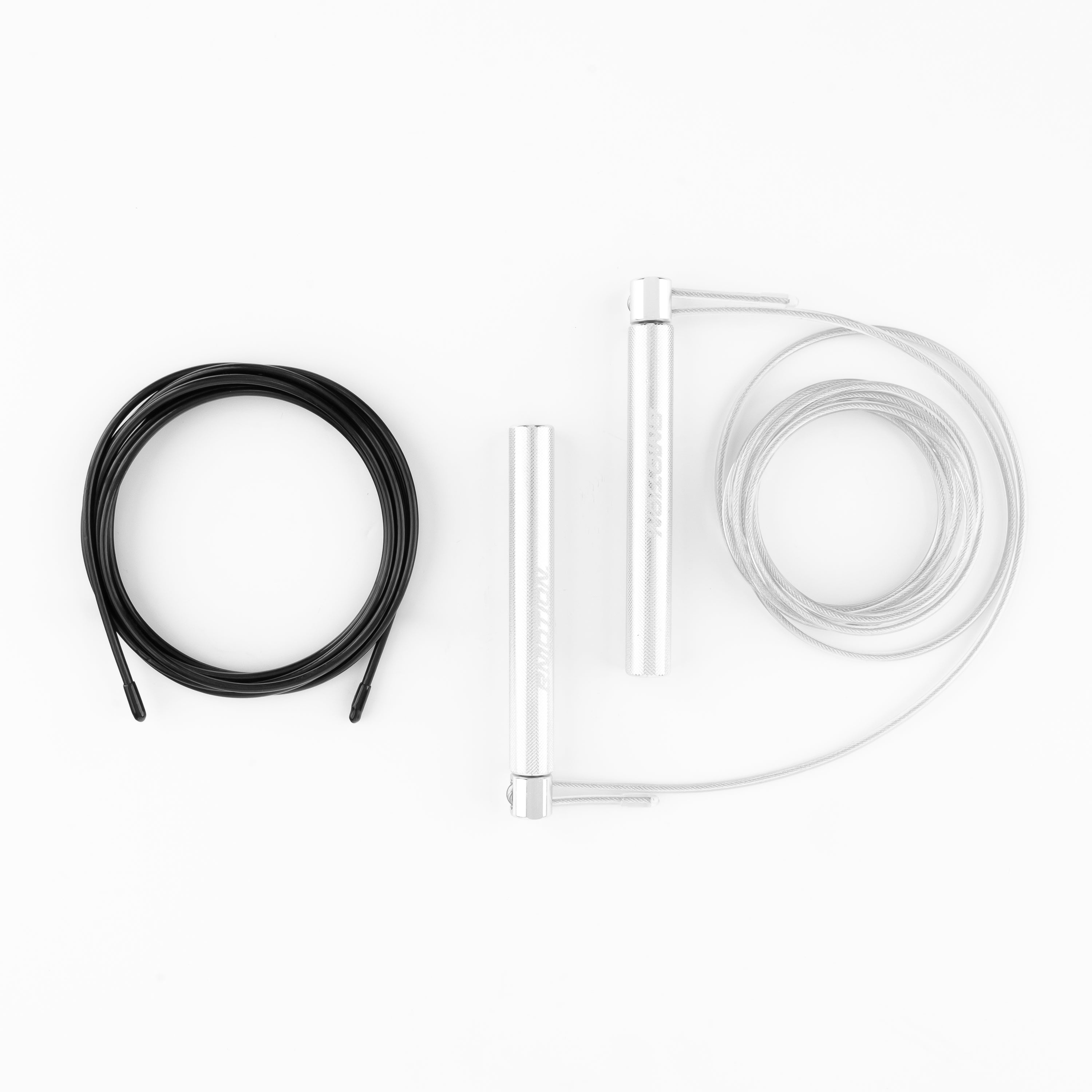 Bmotion Speedrope mit schwarzem PVC- und transparentem Stahlkabel – Top-View der austauschbaren Seiloptionen für individuelles Training.